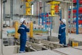 Engineer worker people working service setup large hydraulic press machine in modern heavy industry factory Royalty Free Stock Photo