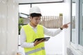 Engineer working on building site with digital tablet Royalty Free Stock Photo