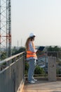 Engineer working on a building site The telephone and internet network signal systems Royalty Free Stock Photo