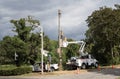 Engineer working in a cherrypicker on the roadside USA