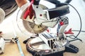 Engineer working on cutting a aluminium and steel with compound mitre saw with sharp, circular blade Royalty Free Stock Photo