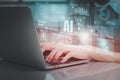 Engineer working on laptop, deep analysis, and program development, using Python code for deep learning and real-time data Royalty Free Stock Photo