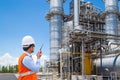 Engineer working at thermal power plant with talking on radio Royalty Free Stock Photo
