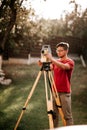 engineer working with total station theodolite at landscaping project Royalty Free Stock Photo