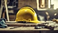 yellow helmet on the table, construction equipments on the table, building helmet background Royalty Free Stock Photo