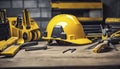 yellow helmet on the table, construction equipments on the table, building helmet background Royalty Free Stock Photo