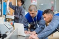 Engineering apprentice in workshop with teacher Royalty Free Stock Photo