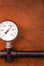 Engineering background base pressure gauge indicator vertical photo rusty iron base