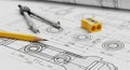 Engineering Blueprint with Drafting Tools Including Compass Pencil and Sharpener drawing Royalty Free Stock Photo