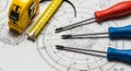 Engineering Blueprints with Measuring Tape and Screwdrivers for Construction and Design drawing Royalty Free Stock Photo