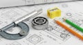 Engineering Blueprints with Micrometer Bearing Pencils and Sharpener technical drawing Royalty Free Stock Photo