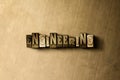 ENGINEERING - close-up of grungy vintage typeset word on metal backdrop
