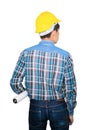 Engineering holding rolled blueprints back turned and wear yellow safety helmet plastic isolated on white background Royalty Free Stock Photo