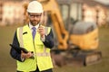 Engineering inspection supervisor. Inspection by building supervisor. Project details. Supervisor engineer. Construction site. Man Royalty Free Stock Photo