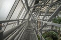 Engineering metal structures of the frame of the greenhouse, view from the technological bridge