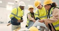 Engineering, people planning and teamwork with blueprint, construction site and building design in warehouse. Industrial Royalty Free Stock Photo