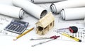 Engineering project architect with tools and wooden house Royalty Free Stock Photo