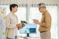 engineering robot technology with asian programmer innovation and research teamwork in coding development
