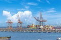 Engineering shipping crane depot at logistic export terminal control. Warehouse freight background container yard loading quayside