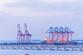 Engineering shipping crane depot at logistic export terminal control. Warehouse freight background container yard loading quayside