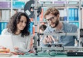 Engineering students using a 3D printer Royalty Free Stock Photo