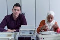 Engineering students working in the lab. Students are adjusting an electrical`s components inside lab Royalty Free Stock Photo