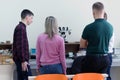 Engineering students working in the lab. Students are adjusting an electrical`s components inside lab Royalty Free Stock Photo