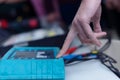 Engineering students working in the lab. Students are adjusting an electrical`s components inside lab Royalty Free Stock Photo