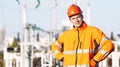 Service engineer standing near heat electropower station