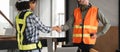 Engineering Team Plans Construction Work with Handshake in Modern Office, Collaboration and Teamwork in Construction Royalty Free Stock Photo