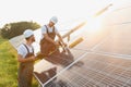 Engineering team working on checking and maintenance in solar power plant, Solar panel technician installing solar Royalty Free Stock Photo