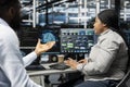 Engineering team working together in data center running AI tools Royalty Free Stock Photo