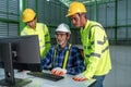 Engineering team working use computer operate in the warehouse design