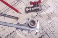 Engineering tools and plumbing details on a technical drawing. Design and production of communications. Royalty Free Stock Photo