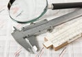 Engineering tools on technical drawing Royalty Free Stock Photo