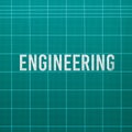 Engineering word on cutting mat Royalty Free Stock Photo