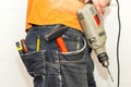 Engineering work tool in the back pocket of the jeans. pencil screwdriver hammer and utility knife Royalty Free Stock Photo