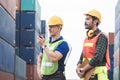 Engineers control containers loading at site