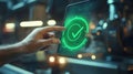 An engineers fingers meticulously scroll over a digital tablet screen that proudly presents a green checkmark with Royalty Free Stock Photo