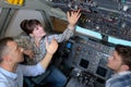 Engineers inside planes cockpit