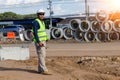 Engineers are inspecting the readiness and completeness of a large construction project involving pipe laying and road Royalty Free Stock Photo