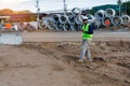 Engineers are inspecting the readiness and completeness of a large construction project involving pipe laying and road Royalty Free Stock Photo