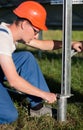 Engineers installing frame for solar panels. Royalty Free Stock Photo