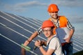 Engineers installing solar panels. Royalty Free Stock Photo