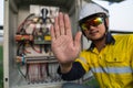 Engineers lifted their hands to show signs that do not enter in to the dangerous area