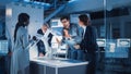 Engineers Meeting in Robotic Research Laboratory: Engineers, Scientists and Developers Gathered Royalty Free Stock Photo