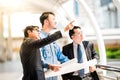 Engineers meeting at terrace on top of construction site. Coworkers discussing. Boss and worker argue. Conversation in team Royalty Free Stock Photo