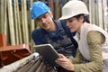 Engineers in metallurgic factory working on digital tablet Royalty Free Stock Photo