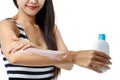 Woman is using a skin cream. Royalty Free Stock Photo