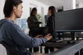 Engineers programming server code algorithm on computer